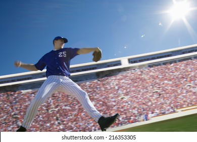 Pitcher throwing baseball