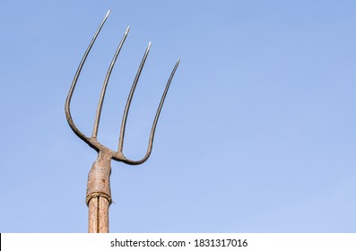 Pitchfork Raised To The Sky, Close-up. Weapons Of The Proletariat.