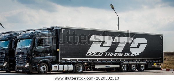 PITESTI ROMANIA August 2 2021 Black Mercedes-Benz\
Actros 1845 Euro 6 truck trailer in traffic. Mercedes-Benz Actros\
wins The Green Truck Award\
2015