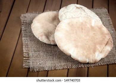 Pitta Bread (Lebanese Bread), Over Old Burlap Background