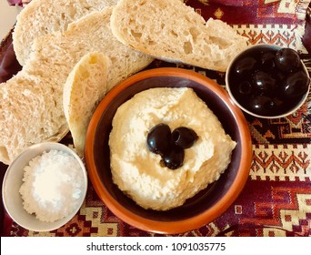 Pitta With Houmous, Olives And Rustic Bread