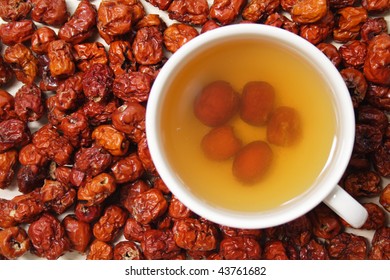 Pitted Chinese Jujubes With A Cup Of Jujube Tea, Taken From Top Angle