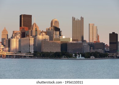 Pittsburgh Cityscape With Ohio River In Background. Business District. Sunset Light.