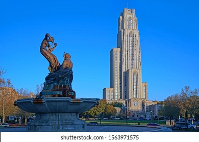 PITTSBURGH - NOVEMBER 2019:  University of Pittsburgh's Cathedral of Learning skyscraper and  Schenley Park Memorial Fountain dating from 1889.