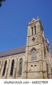 PITTSBURGH, PA -JUNE 3,2017:St. Peter Catholic Church With Clear Blue Sky As Background.Closeup Of Church Tower At Pittsburgh, PA On June 3, 2017