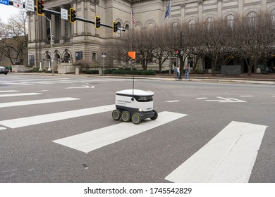 Pittsburgh, PA, USA, 2020-01-11: Starship Robot Out Making A Delivery