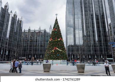 Pittsburgh, PA, USA, 2020-01-11: Visitors Ice Skating Around PPG Christmas Tree