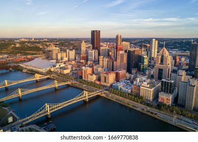 PITTSBURGH, PENNSYLVANIA - SEPTEMBER 25, 2019: Aerial view of Pittsburgh, Pennsylvania. Business district and river  in background. Three Bridges in Background