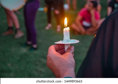 Pittsburgh, Pennsylvania / United States - 7-12-19: A Man Holds His Candle At The Lights For Liberty Vigil