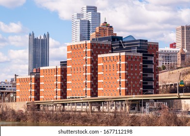 Pittsburgh, Pennsylvania, USA 3/15/20 The Allegheny County Jail With Downtown Pittsburgh In The Background On A Sunny Winter Day