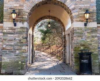 Pittsburgh, Pennsylvania, USA December 12, 2021 The walkway through the Gatehouse in Frick Park in the Point Breeze neighborhood on a sunny winter day