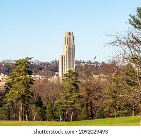 Pittsburgh, Pennsylvania, USA December 12, 2021 The Cathedral of Learning on the campus of the University of Pittsburgh as seen from Schenley Park on a sunny winter day