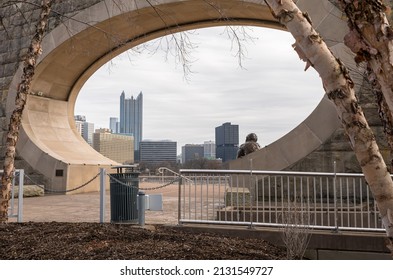 Pittsburgh, Pennsylvania, USA February 24, 2022 The Mr. Rogers Memorial on the Allegheny River overlooking downtown on a winter day seen in front of the former Manchester Bridge pier 