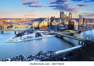 PITTSBURGH, PENNSYLVANIA, USA - JAN. 2014: The city skyline view of Pittsburgh, the second largest city of Pennsylvania in winter sunset.
