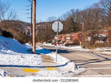 Pittsburgh, Pennsylvania, USA January 21, 2022 Commercial Street as seen headed towards Frick Park in the Swisshelm Park neighborhood on a sunny winter day
