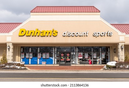 Pittsburgh, Pennsylvania, USA January 25, 2022 The entrance to the Dunham's Discount Sports store in the Waterworks Shopping Plaza on an overcast winter day