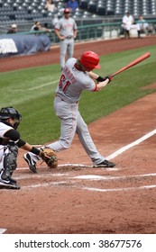 PITTSBURGH - SEPTEMBER 24 : Bronson Arroyo Of The Cincinnati Reds Takes A Swing Against The Pittsburgh Pirates On September 24, 2009 In Pittsburgh, PA.