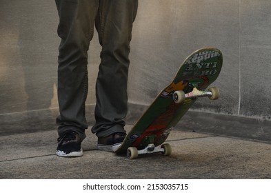 PITTSBURGH, UNITED STATES - Jul 31, 2014: A Skater Guy With His Skateboard Outdoors