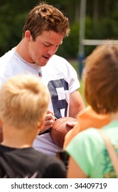 PITTSFORD, NY - JULY 27: Buffalo Bills TE Derek Fine Signs Autographs For Fans At Training Camp At St. John Fisher College On July 27, 2009 In Pittsford, NY (near Rochester).