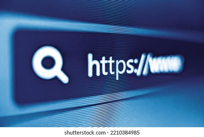 Pixelated closeup view of an internet browser address bar with https and search icon in blue - Shutterstock ID 2210384985