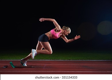 pixelated design of woman  sprinter leaving starting blocks on the athletic  track. Side view. exploding start