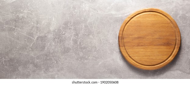 Pizza Or Bread Cutting Board For Homemade Baking On Table. Food Recipe Concept At Stone Background Texture With Copy Space. Flat Lay Of  Panorama, Panoramic Top View