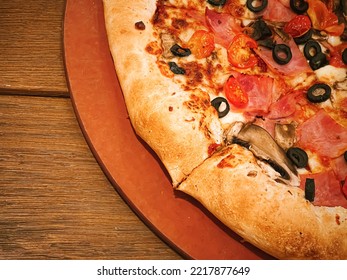 Pizza Capriciosa With Cheese Stuffed Crust In Pizzeria, Food Close-up