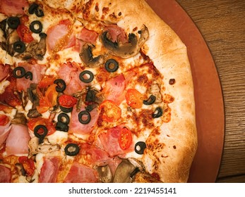 Pizza Capriciosa With Cheese Stuffed Crust In Pizzeria, Food Close-up