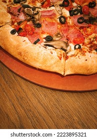 Pizza Capriciosa With Cheese Stuffed Crust In Pizzeria, Food Close-up