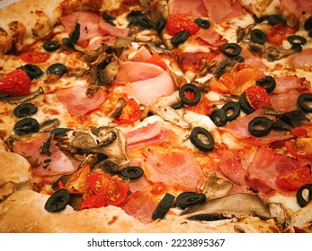 Pizza Capriciosa With Cheese Stuffed Crust In Pizzeria, Food Close-up