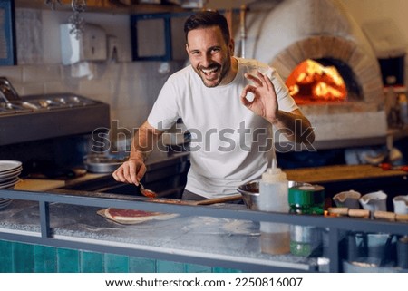 Pizza chef working in the kitchen