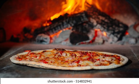 Pizza Cooked In A Wood Oven