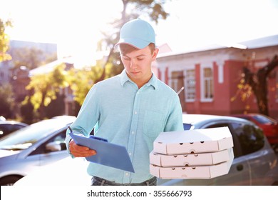 Pizza Delivery Boy Holding Boxes With Pizza, Outdoors