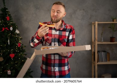 Pizza Delivery Home, Man Eating A Slice Of Pizza Holding A Box, Christmas At Home Alone, Christmas Food Delivery Concept