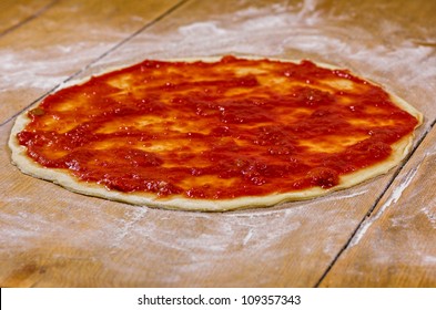 Pizza Dough With Tomato Sauce