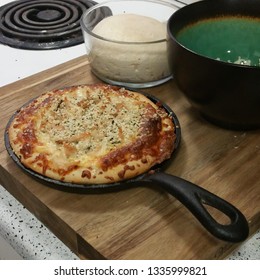 Pizza Fresh Out Of The Oven In A Personal Size Cast Iron Pan