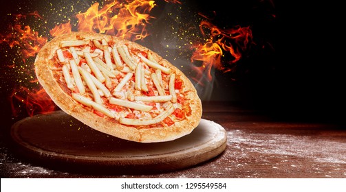 Pizza With Fries On Top As A Filling. Two In One Combined Sentence.