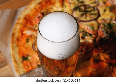 Pizza And A Glass Of Beer