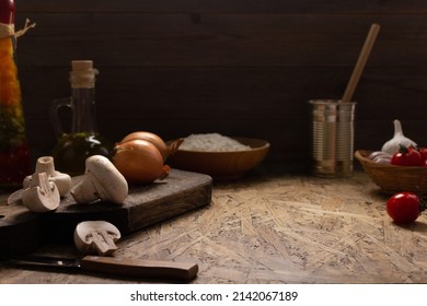 Pizza ingredient for homemade cooking or baking on table. Chile pepper at wooden tabletop background. Recipe concept in kitchen - Powered by Shutterstock