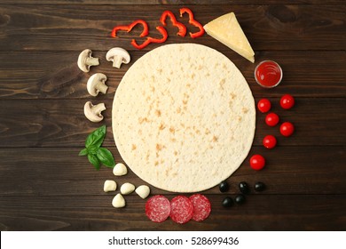 Pizza Ingredients On Wooden Background