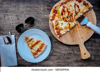 pizza italian foods cheese on wood background.