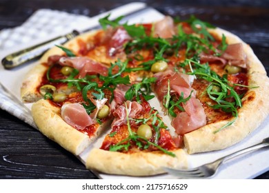 Pizza With Jamon And Arugula.