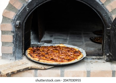 Pizza Made In A White Painted Artisan Wood Oven Built On The Outside