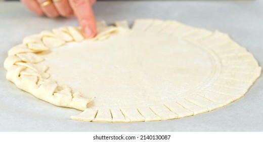 Pizza Making Process. Top View Of Pizza Dough Base. Home-baking Pizza With A Braided Pie Crust. Close Up