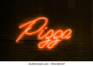 Pizza - neon sign on a brick wall at night. Restaurant take out pizzeria - Powered by Shutterstock