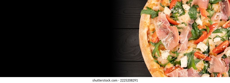 Pizza With Parma Ham, Mozzarella Cheese, Arugula, Cherry Tomatoes On Dark Background. Traditional Italian Pizza On Wood Top View. Banner