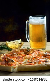 Pizza With Seafood And A Glass Of Light Beer