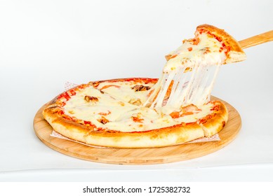 Pizza And A Slice Of Cheese On A White Background