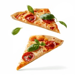 Pizza Slices Flying, Isolated On White Background. Delicious Peperoni Pizza Slices Pepperonis And Olives, Floating Pizza Pieces With Melting Cheese With Basil Leaves Flying. Italian Style Pizza Slices