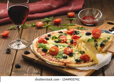 Pizza With Wine Tomatoes Cheese And Arugula